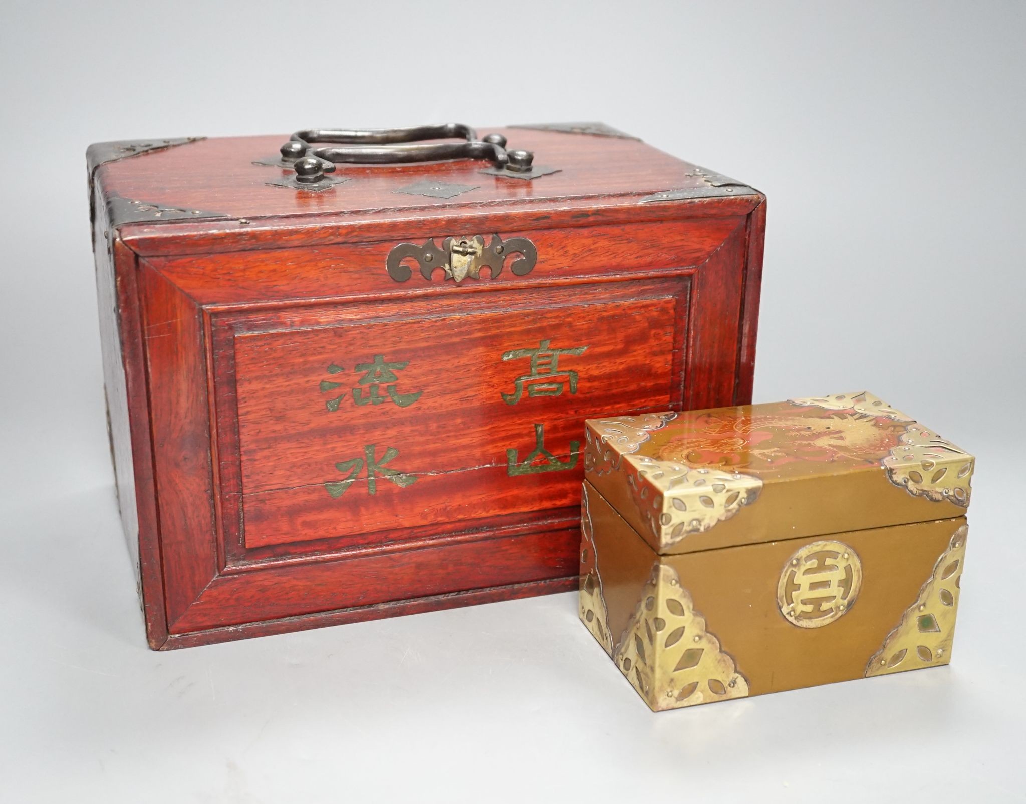 A MahJong set and a Chinese brass mounted card case., MahJong set, 15.5 cms high x 23.5 cms wide.